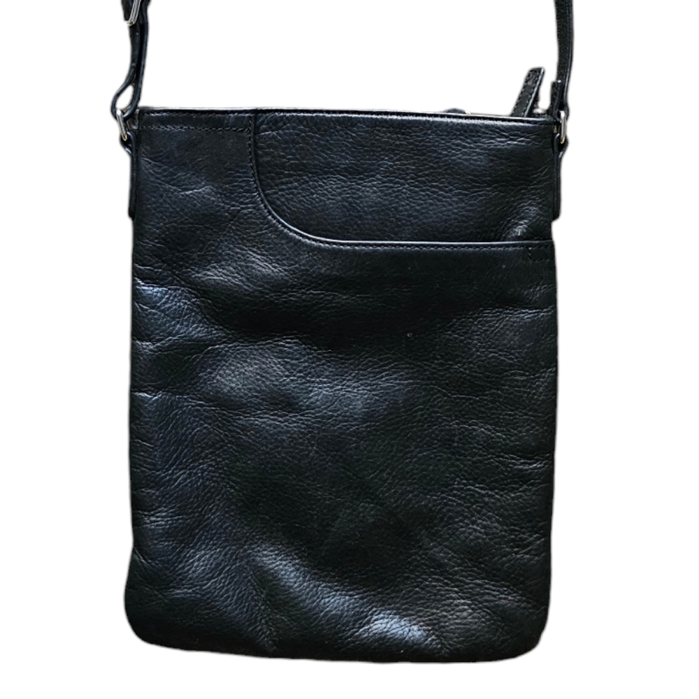 Margot black leather crossbody bag with corner pocket on a front